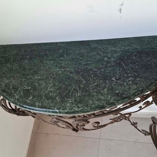Metal console used with marble top and ornate wrought iron design