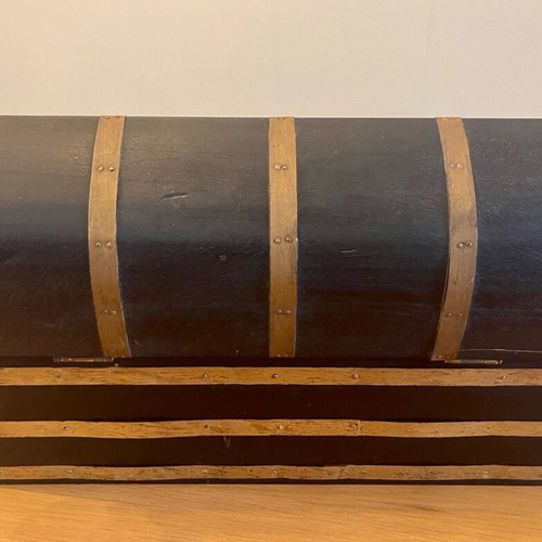 Antique wooden chest used with medieval emblem