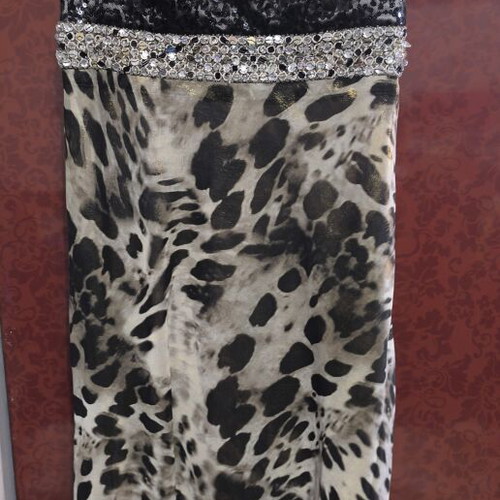 Dress with symmetrical design and elegant details