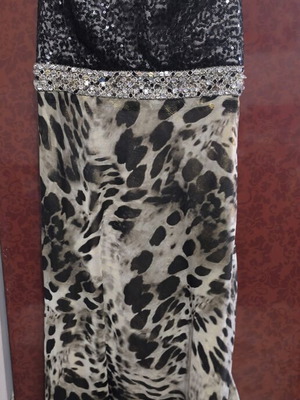 Dress with symmetrical design and elegant details