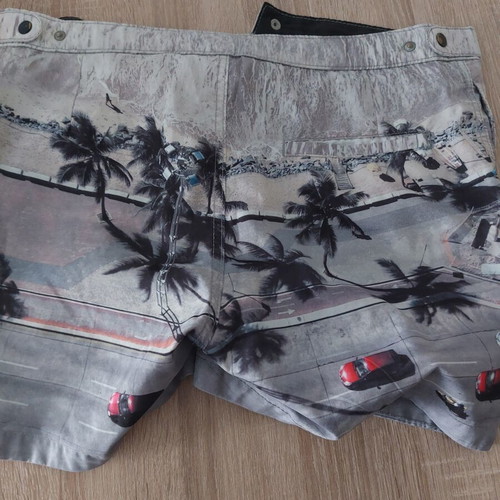 H&M men's swim shorts small used, multicolor