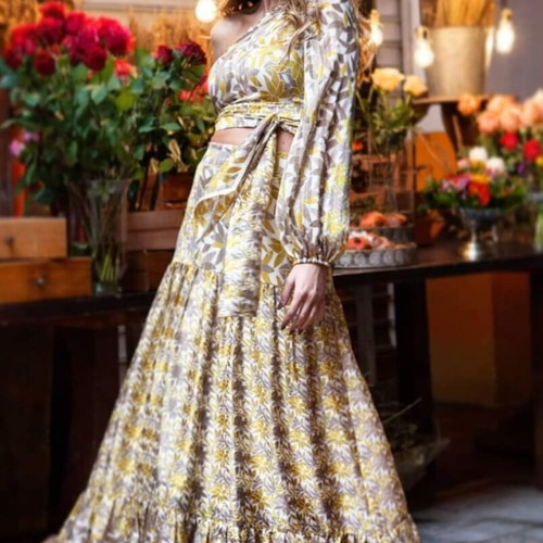 Anna Samouka set used with one-shoulder top and high-waist maxi skirt