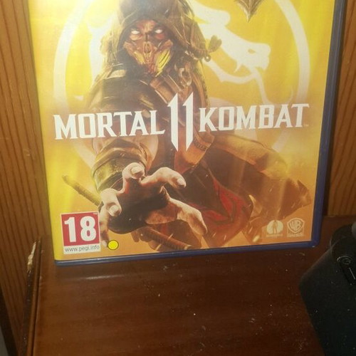 Playstation 4 Slim used with 500GB and Mortal Kombat 11
