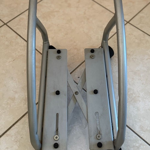 Metal computer tower stand used with wheels