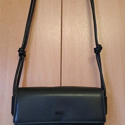 Dkny black leather crossbody bag like new with knot design strap
