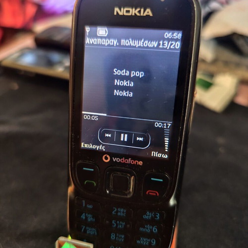 Nokia 6303 Classic phone used, black, with charger