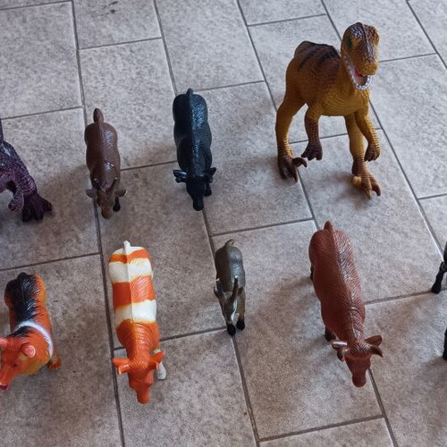 Lot of 12 assorted animal and dinosaur figures