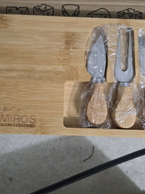 Cheese cutting set new with cutting board and knives