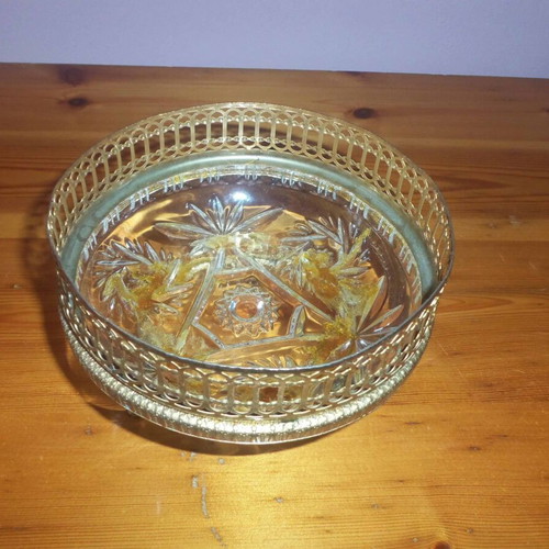 Tabletop metal fondue pot used with intricate decoration