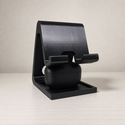 3D Phone Stand with Earphone Holder like new