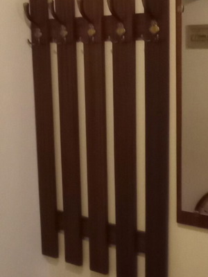 Wooden wall coat rack used, dark brown