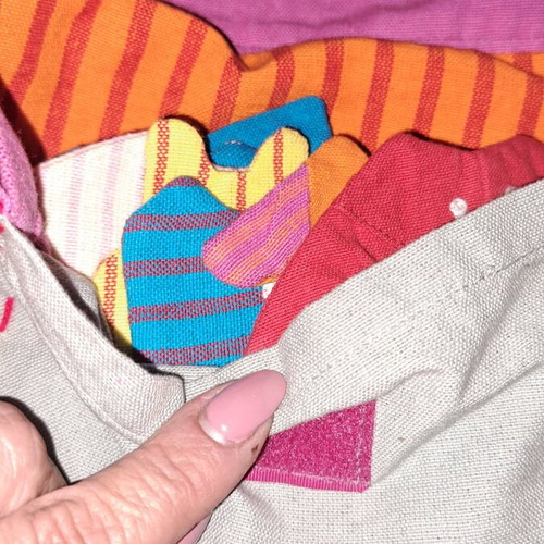 Cloth bag with doll and clothes used