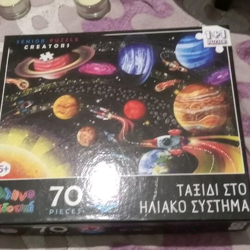Puzzle Journey to the Solar System like new, 2 puzzles of 70 pieces