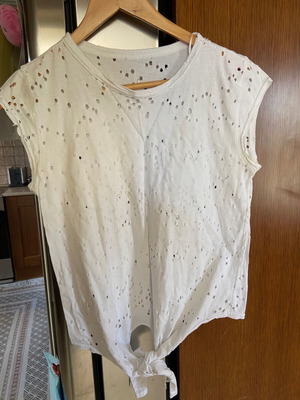 White t-shirt used with small cut outs, size small-medium