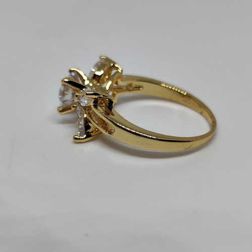 Elegant women's ring with central crystal and decorative petals, like new