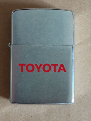 Zippo lighter with Toyota logo like new