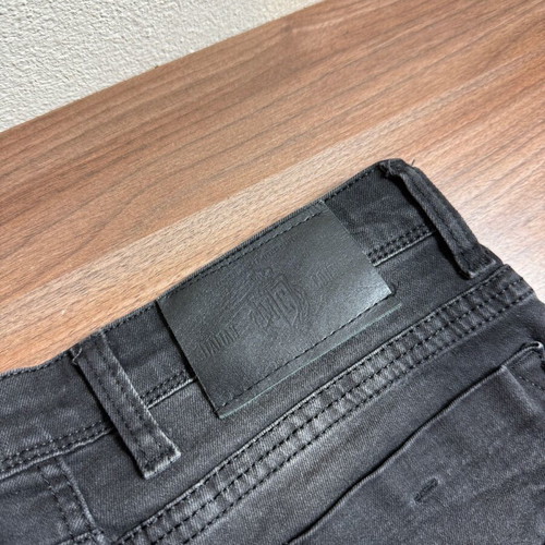 Men's/Unisex black jeans with faded finish like new