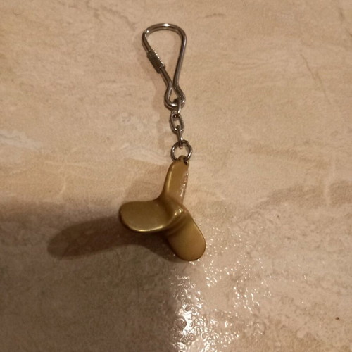 Keychain like new, metal and gold