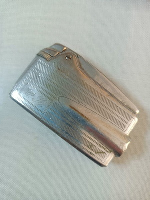 Collectible lighter used, non-functional with engraved monogram