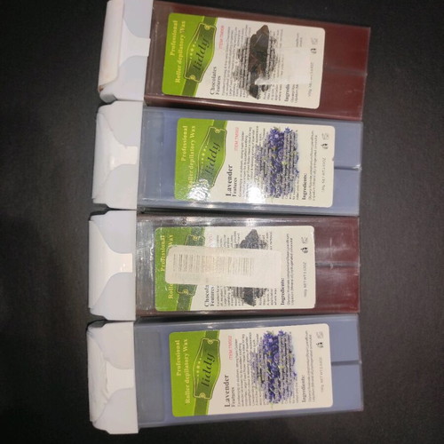 Waxing set with wax cartridges and electric wax heater