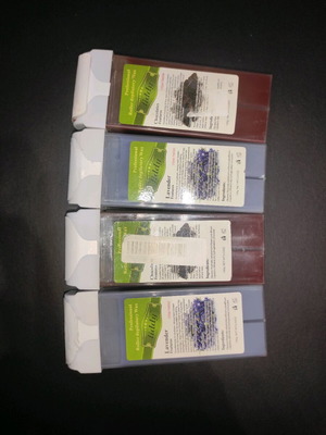 Waxing set with wax cartridges and electric wax heater