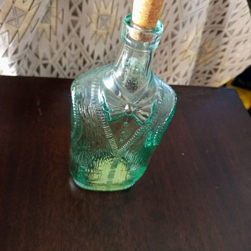 Vintage glass bottle Bormioli Rocco with vest and bow tie design, like new
