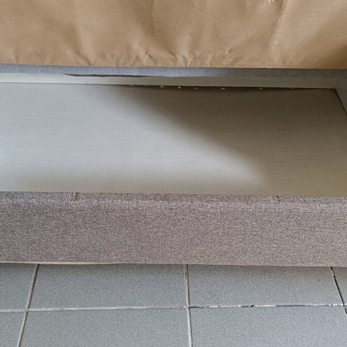 Two-seater sofa bed with storage space