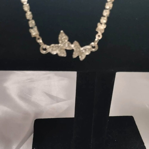 Bracelet with shiny butterflies new, white and silver