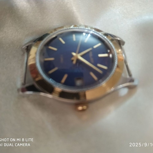 Poljot mechanical wristwatch like new, blue dial, gold bezel