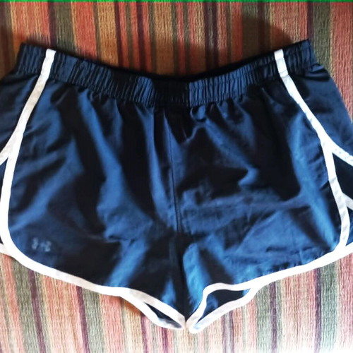 Running shorts Under Armour like new, black with white details