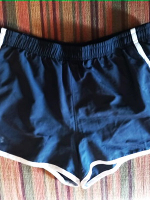 Running shorts Under Armour like new, black with white details
