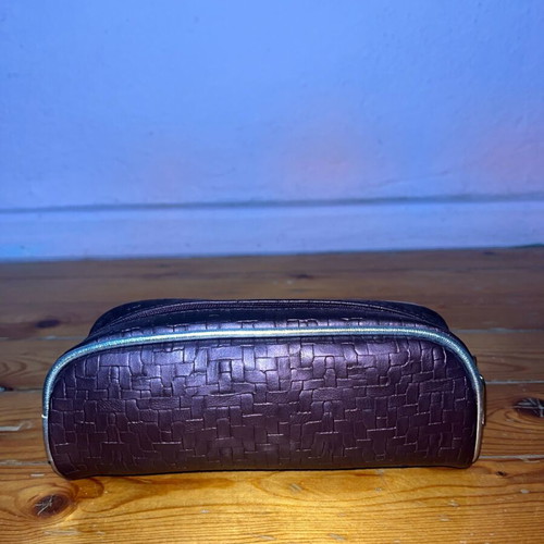 Oriflame cosmetic bag like new, brown embossed design