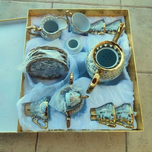 Porcelain tea and coffee set new, luxury with gold and floral details