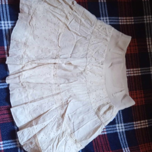Girls' skirt like new, summer with cutout flower design beige