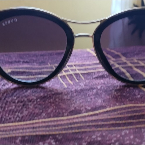 Guess women's sunglasses set used, black and gold, pack of 2