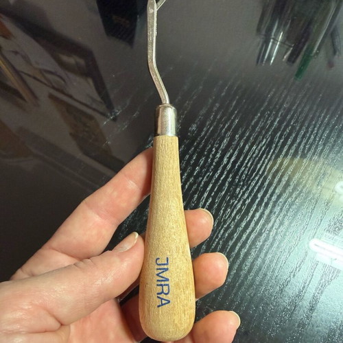 Rug hook like new with wooden handle