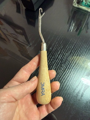 Rug hook like new with wooden handle