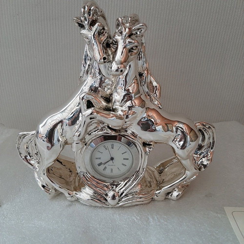 Italian silver-plated clock new