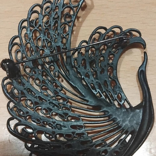 Black brooch new with rhinestones in peacock shape