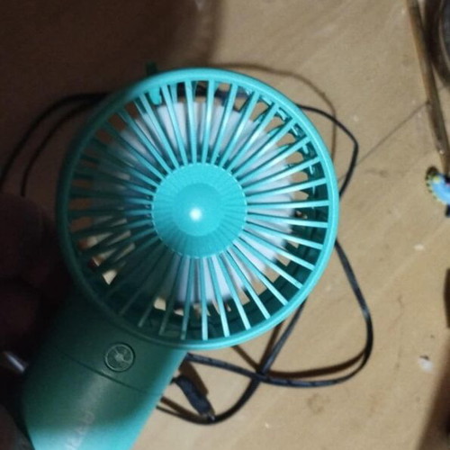 Handheld fan used with charger, battery-free, fully functional