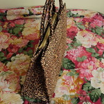 Leopard print women's handbag with strap
