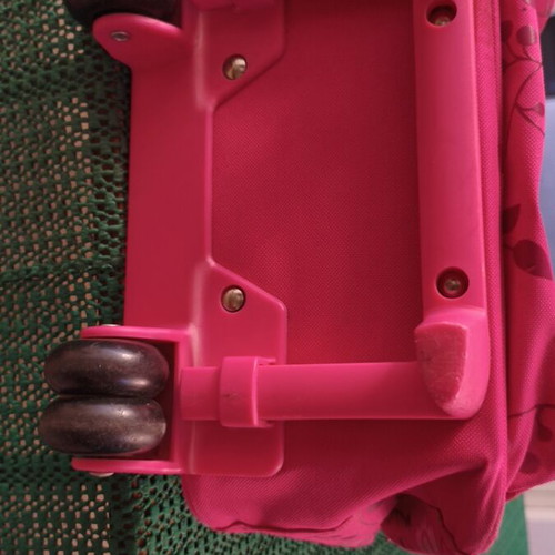 United Colors of Benetton school trolley bag, fuchsia with floral and butterfly design