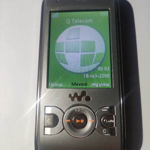 Sony Ericsson W595 slider phone, beige gold