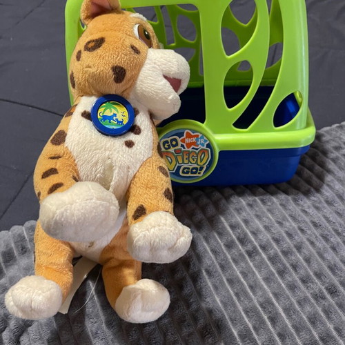 Diego toy like new with plush animal and Dora Explorer carrying case