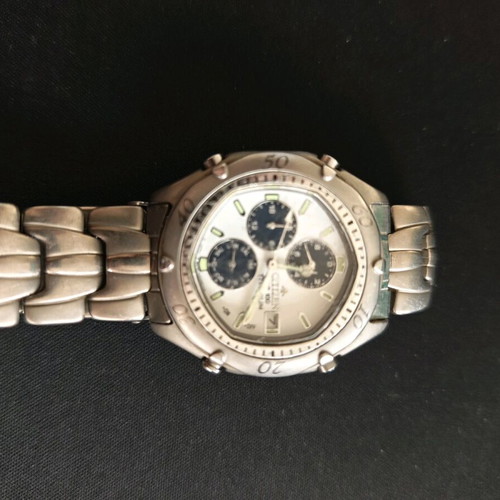 Citizen titanium Promaster watch men used, non operational, wr 100, model 6870-H11101