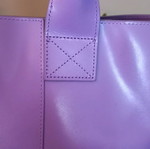 Large branded bag with unique defect