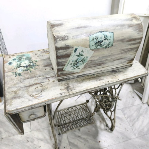 Singer sewing machine decorated with decoupage and aging, used