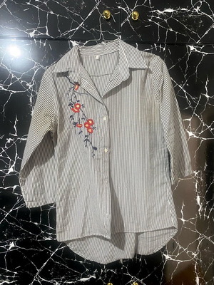 Striped shirt women's size M like new with embroidered flowers