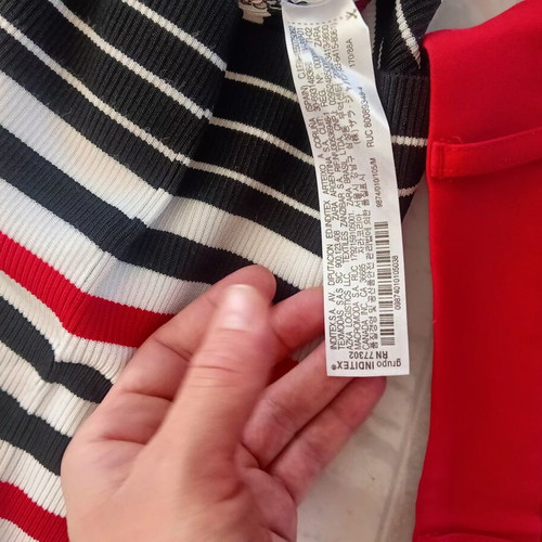Zara striped women's blouse with bag and Stradivarius trousers set