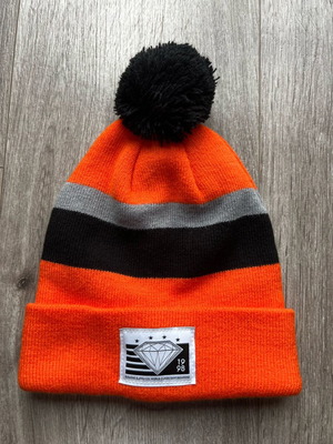 Diamond Supply Co. hat new, orange and black with pompom